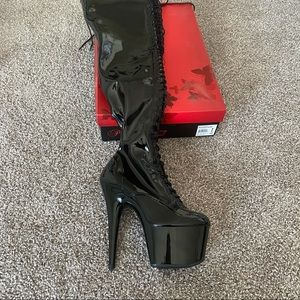 Thigh High Lace Up Platform Boots. Women’s size 10. Seven inch heel. Never worn.